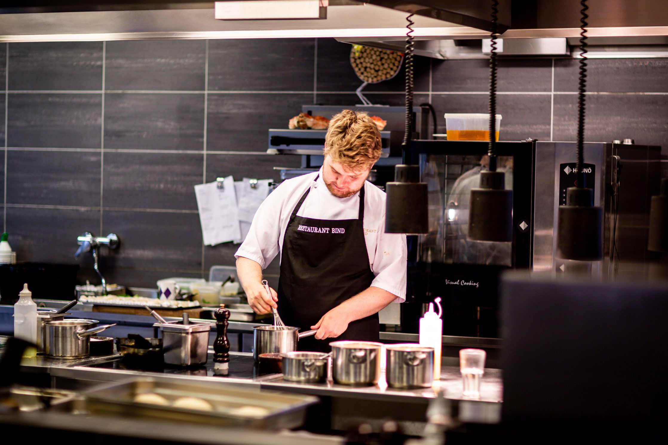 Chef Cooking in Kitchen